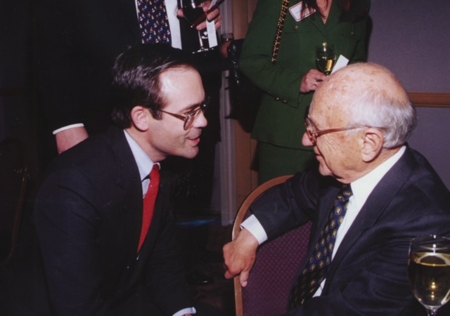 With Dr. Milton Friedman