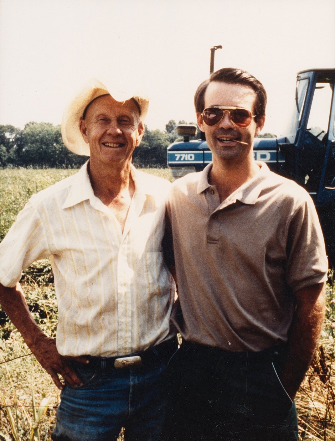 Fritz and Dad on the Tractor, 1985